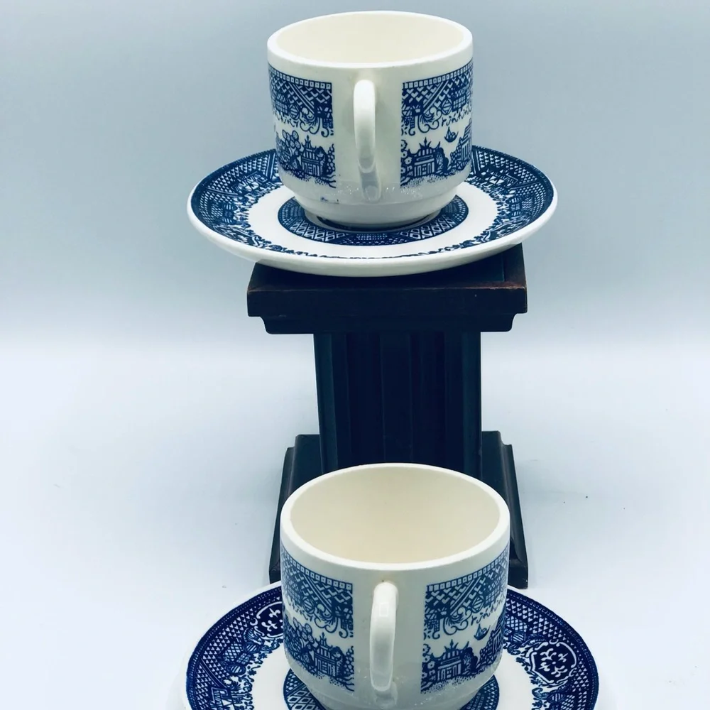 Vintage lot of 2 Blue Willow tea cup and saucer set. Marked U.S.A.
